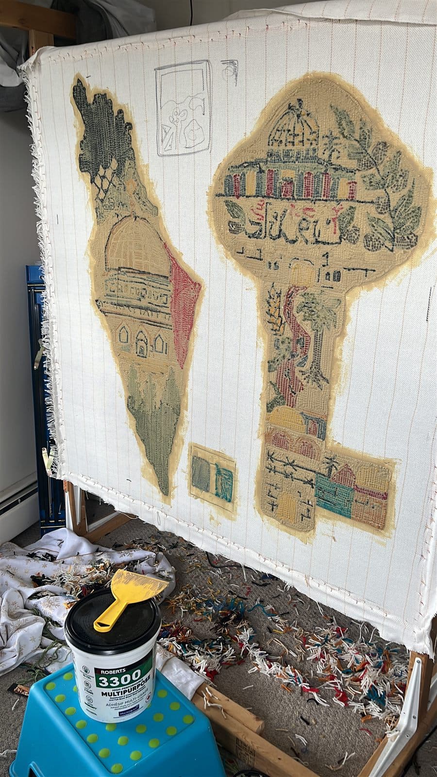 The mosaic key on the frame, mid-tufting